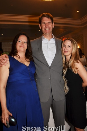 9. Melissa Bilash chatted with David and Vanessa Oliver during the reception.