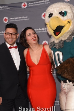 9. Clay Stiles and Rebecca Cruz said hello to Swoop, the Eagles mascot .