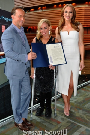 10. Philadelphia City Representative Sheila Hess (center) came to the anniversary event with a “Tribute” from the City of Philadelphia. Sheila presented it to Publisher John Colabelli and Group Editor Kristen Detterline.