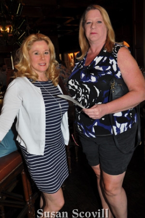 6. Michele Alifora and Carol Willis checked out the raffle prizes.