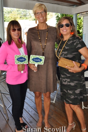 8. Tina Aberant, Marnie Bowen and Leslie Morgan modeled clothing from Louella's during the brunch.