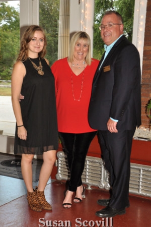 2. Joanie Sweeney, Debbie Cassidy and Tom Cavanaugh welcomed guests to the event.