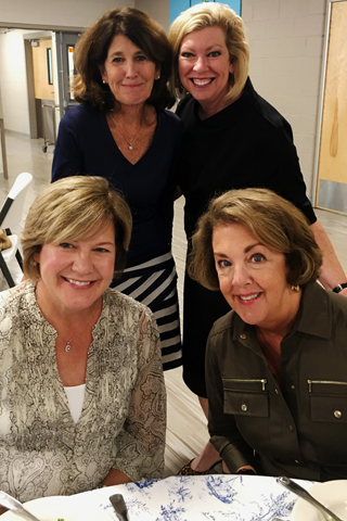 3.Jane Dooner, Mary Ann Bond, Meg Spence, and Chris Ostrander share a table at the new member's luncheon.