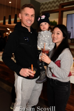 7. Geoff Bough and Cheryl Chow brought their infant daughter Madeline to the Pilates class.