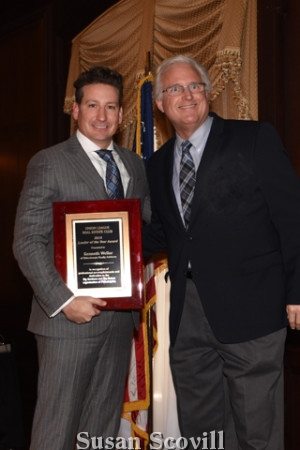 3. Ken Wellar received the Leader of the Year Award from Bill Pennewell.