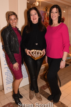 3. Anita Grossberg and Mary Dougherty offered chocolates to all who stopped by to view Perry Milou's work on display at the boutique! Palm Restaurant GM Julie Millard, paused for a photo during the meet and greet.