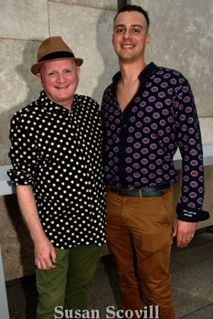 4. Sean Timmons wearing his polka dot-themed shirt chatted with Brian LaPann of Mole Street Artists.