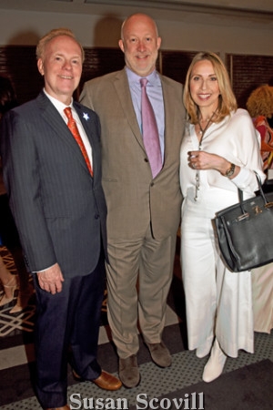 7. Mary and Rich Parente co-chaired the Ball on the Square Patron Party. They discussed the upcoming Ball on the Square auction items with Alasdair Nichol(center).