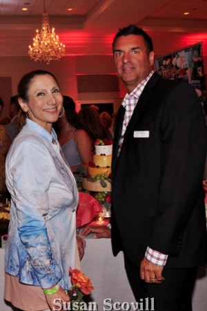6. Conni McDonell chatted with John Serock at the event.