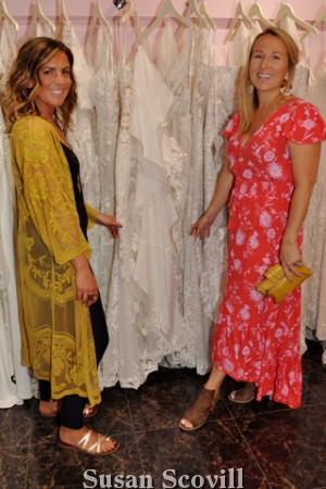5. Dani Clarke and Tricia Notte examined the wedding gowns at the Van Cleve Wedding Pavilion