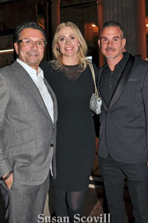 20. John Bolaris chatted with Andrea Desy Edrei and her husband Daniel Edrei at the Holiday Party.