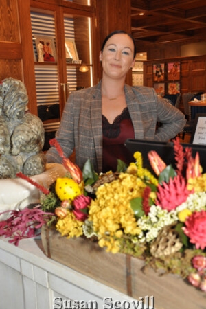 White Dog Cafe manager Kathleen Malin at the reservation desk