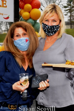 11. Gina Skliw helped Sue Dachile serve hors D’oeuvres to Tasty Table guests.