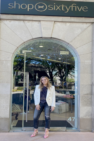 Linda pauses for a photo at the ShpSixtyFive entrance