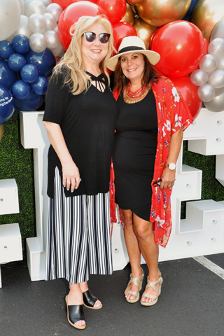 2. Coleen Markle and Marcia Weller of Closets by Design loved the balloons! The balloons were provided by Alison Kahan, Balloon Stylist of CharmingGardens.com