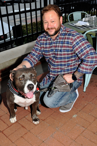 7. John Jordan sais hello to Honey Boy, an American Bull Dog.
