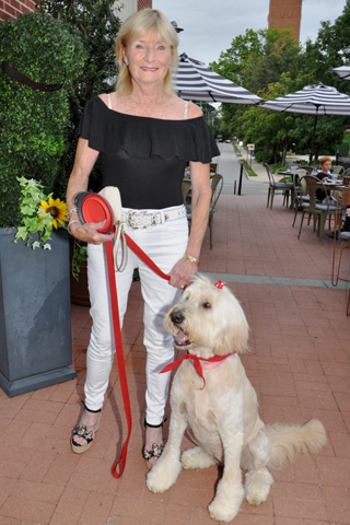 8. Cathy Holland brought her Golden Doodle to the Alpha Cannine benefit event.