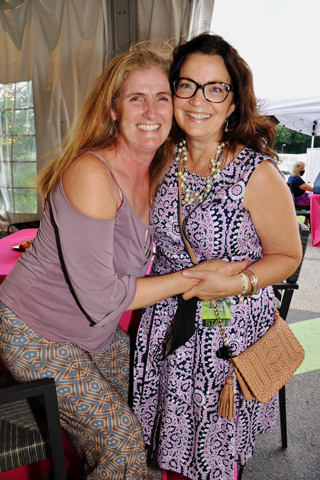 14. Bonni Gillen shared a moment with Christine Reimert.