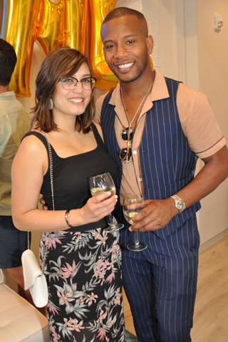 2. Gabrielle Ochoco and Sabir Peele attended the opening event.