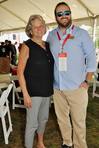 19. Sallie Dixon chatted with Concours Public Relations committee member Andrew Goodman. Sallie Dixon's husband, i the founder of Thoprncroft, the events beneficiary.