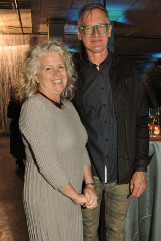 19. Kate Kramer and Christopher Poehlmann designed the set.