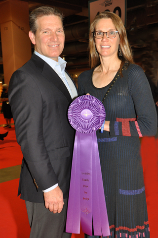 5. Matthew and Anja Levitties got ready to present a ribbon.