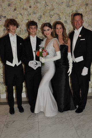 2. Jack, Max and Laura and Chris Jones gathered for a photo with their daughter Kate, a 2021 Debutante.