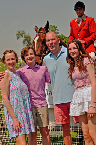 5. Dr. Jennifer Gilbert and her family, Ryan, Matthew and Katie Gelber enjoyed a visit by horse and rider during the Race Day event!