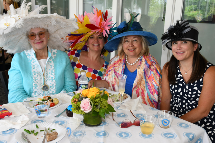 18. Janice Wetherill and her daughter Amanda Holmes enjoyed luncheon with their guests at the Devon Club