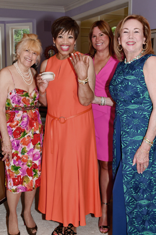 A group of the ladies gathered together to give Pat this beautiful bracelet for her birthday. Susan Jablokov, Michellle Matus and Brigid McGrath Stasen made the presentation.