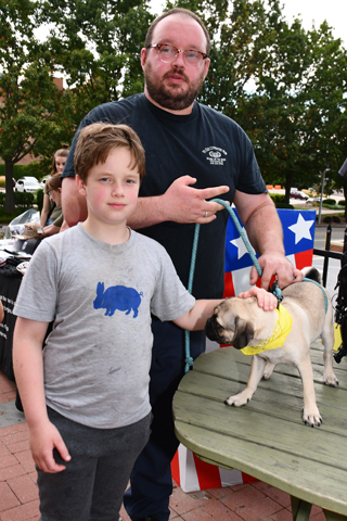 4. Henry and Josh White brought their “pug” Mochi