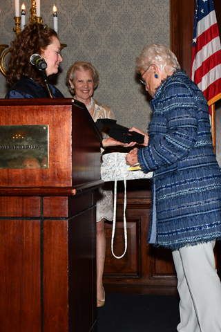 Hannah Henderson approached the diaz to receive her award