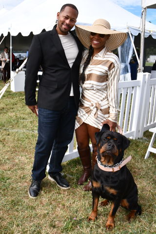 13. Paul Brown chatted with Shadaria Shuler and her dog, Blue