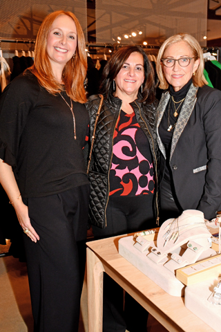 3. Vanda Thomas and Ann Lagos helped Adrina Hoplamazian (center) make a “Realm” jewelry choice
