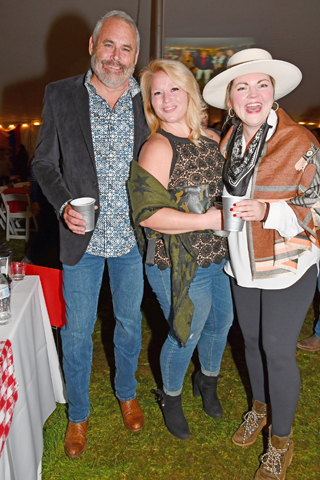 11. Mark Gibbons, Emily Vay and Maryellen Derr had fun at the event