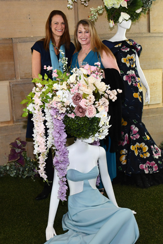  3. Anna Christian and Pamela Waters loved the floral and gown display 