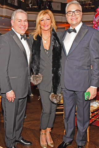 15. Lisa Buckingham chatted with Marcello Luzi ( left) and Greg Seitter (right)