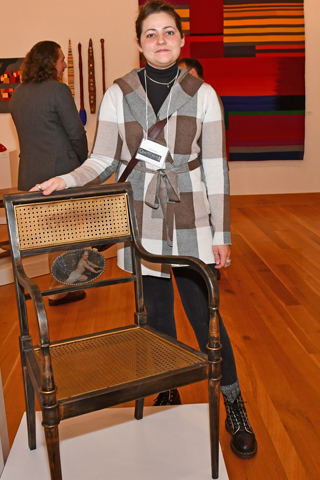17. Sophie Glenn and the chair she created that is named “Gorgeous George”