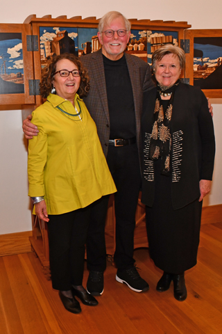18. Juror Janine Falino and Wayne Art Center Executive Director Nancy Campbell congratulated the grand prize winner Charles Sharbaugh for his beautiful cabinet called '‘Roadscape” 