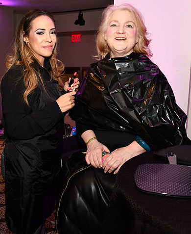 8. Dayna Bodon of Bold & Confident applied cosmetics to Jacqueline Lewis during the VIP reception