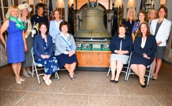 Women Leaders gather for photo with Justice Bell in bell tower of Washington Memorial Chapel