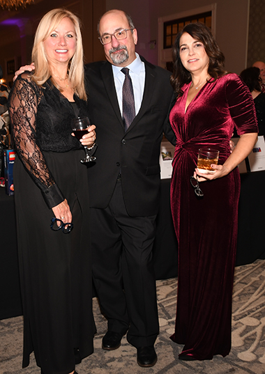 Jody and Dean Sophocles and Kim Caruso