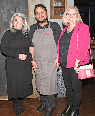  Maureen MCAleer and Theola Benz sampled hors d’oeuvres butlered by Amada’s Ervin Guerra during the preview event 