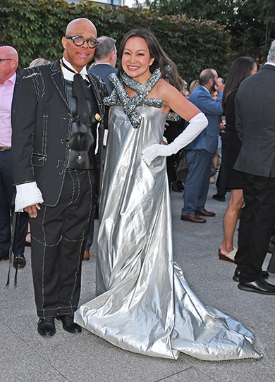 Conrad Boooker dressed Jen Su in on of his dramtic creations